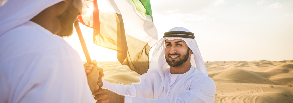 An Emirati man with the UAE Flag